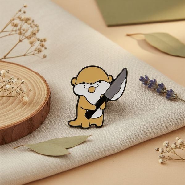 Pin's Loutre avec Couteau