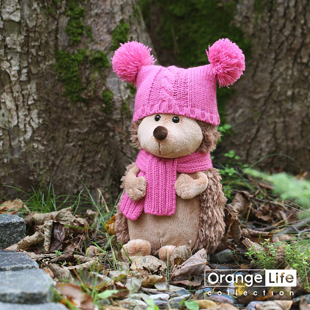 Fluffy hedgehog plush toy with double pom-pom hat, 15 cm