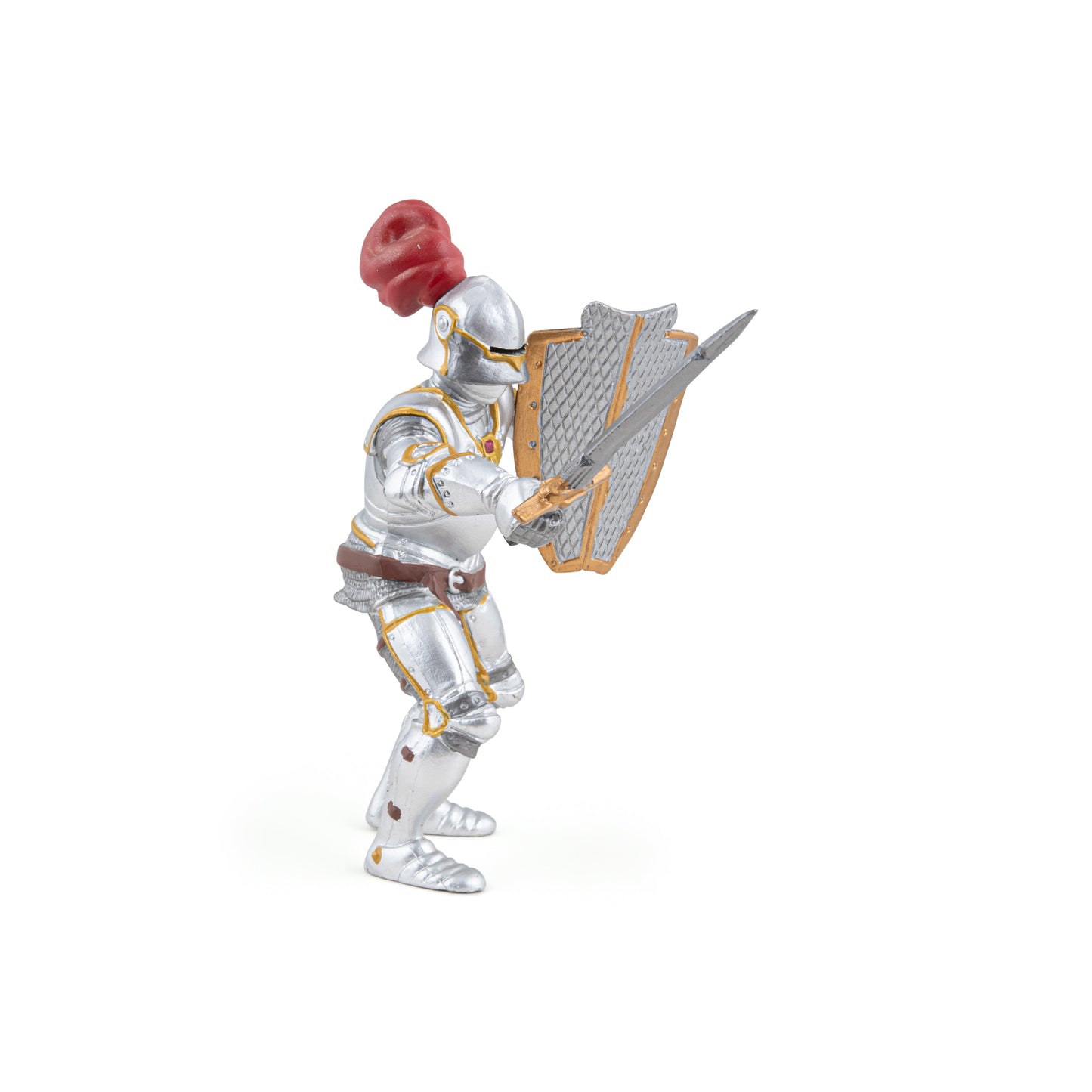 Knight figurine in armor with red plume