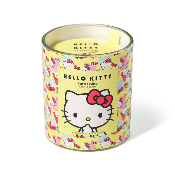 Vela amarilla con estampado original de Hello Kitty, aroma Tutti Frutti