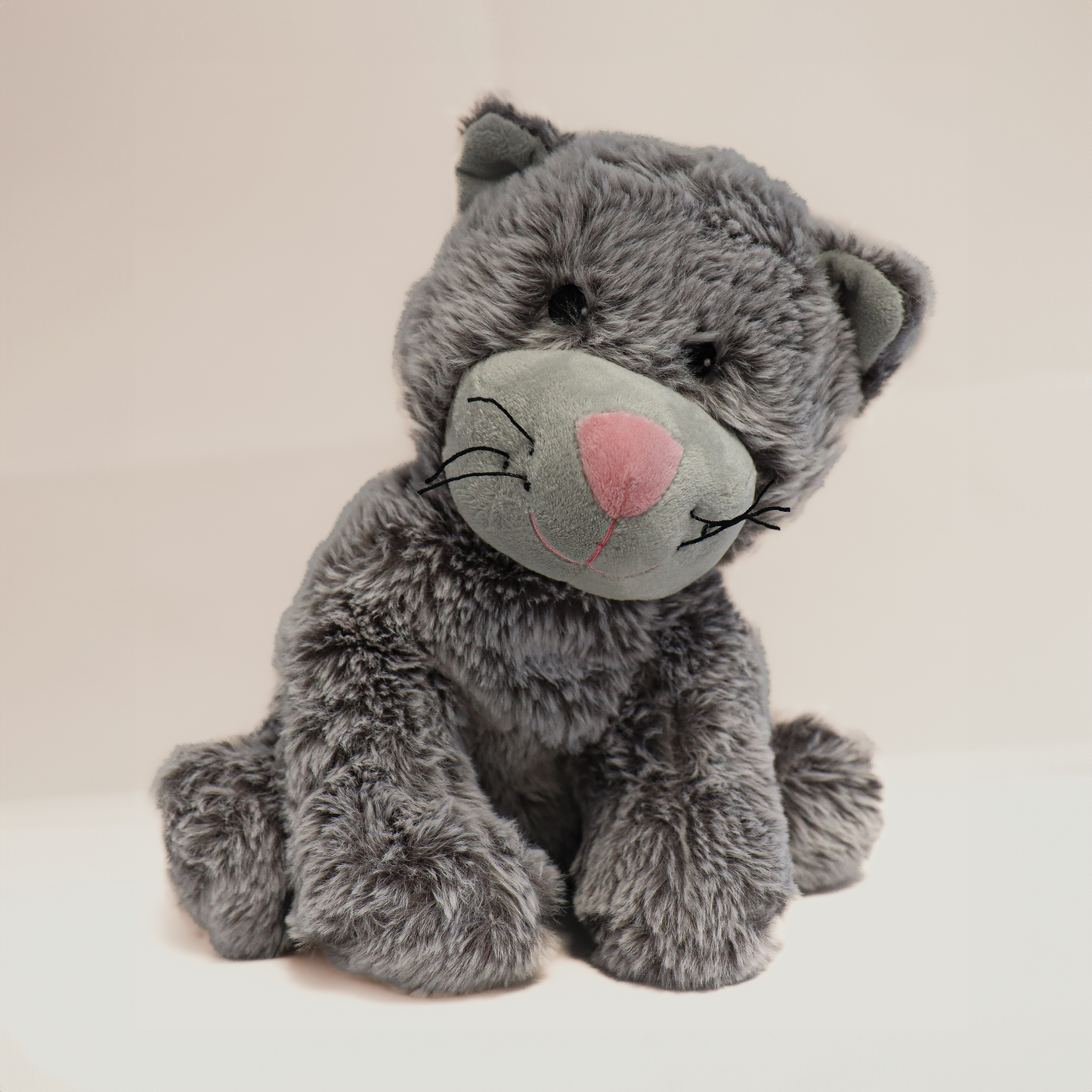 Gato de peluche Warmies com bolsa de água quente