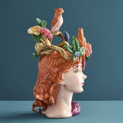 Vase with a woman's head by M. Parrots