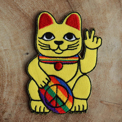 Parche con el símbolo de la paz del gato ondeando