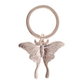 Sleutelhanger met een maanvlinder in de kleur Light Luna