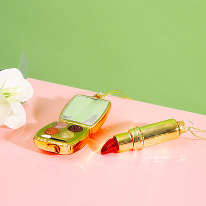 Bola navideña de lápiz labial rojo