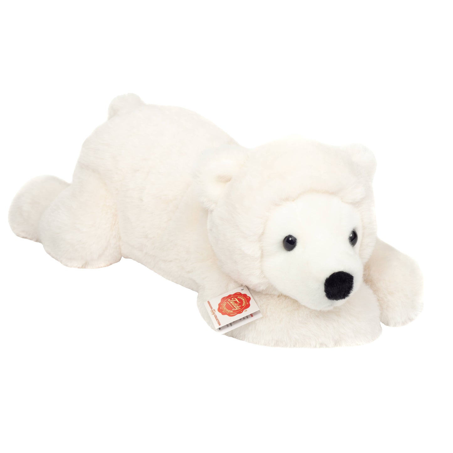 Oso polar de peluche acostado