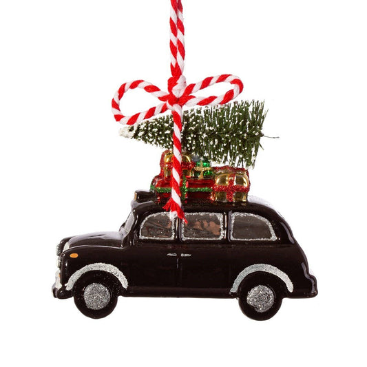 Black Christmas bauble in the shape of a taxi in London
