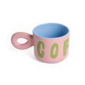 Taza de café rosa