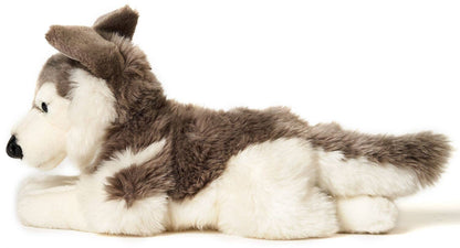 Peluche de husky gris acostado