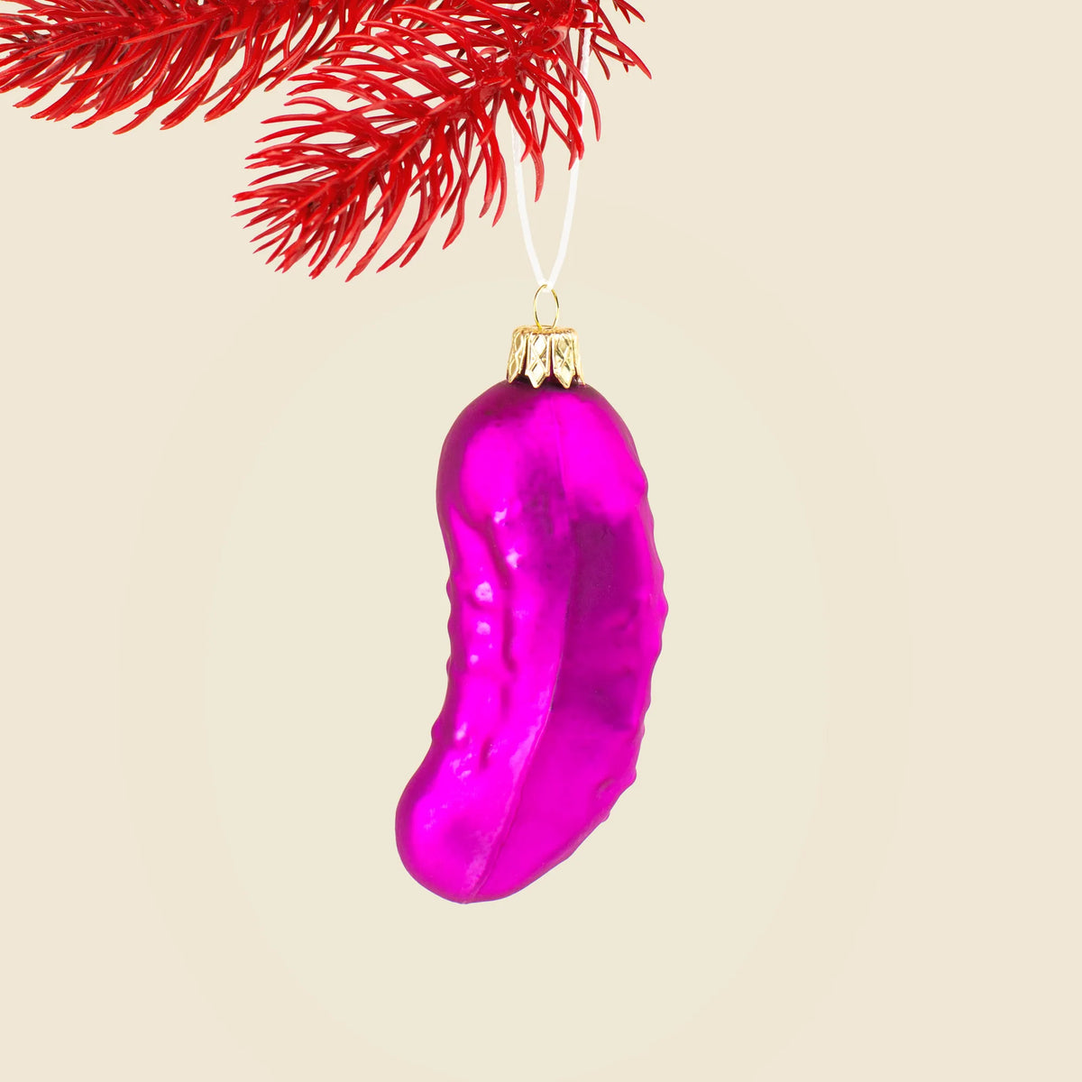 Enfeite de Natal em forma de pepino rosa