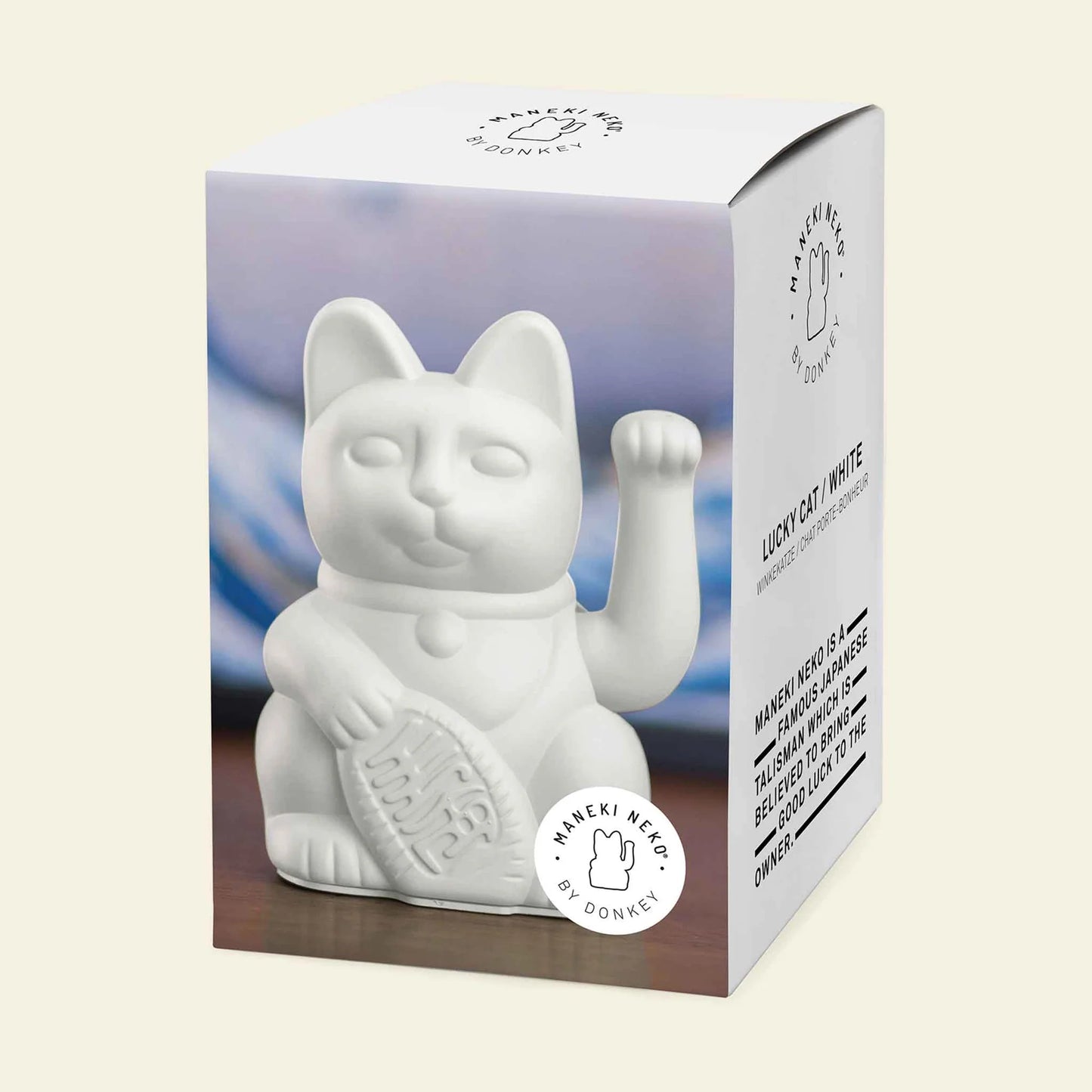 Gato blanco afortunado