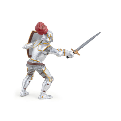 Knight figurine in armor with red plume