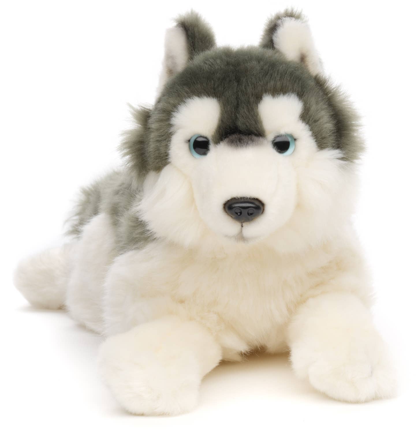 Peluche de husky gris, acostado