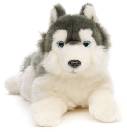Peluche de husky gris, acostado