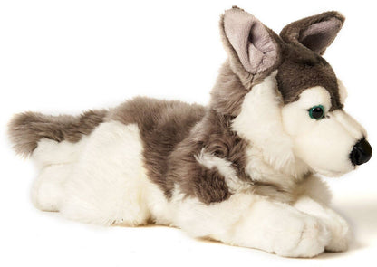 Peluche de husky gris acostado