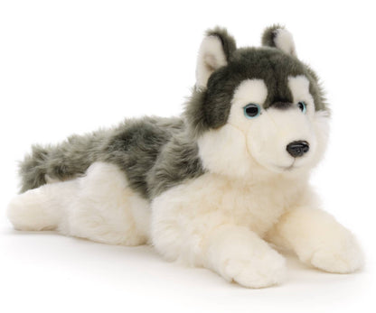 Peluche de husky gris, acostado