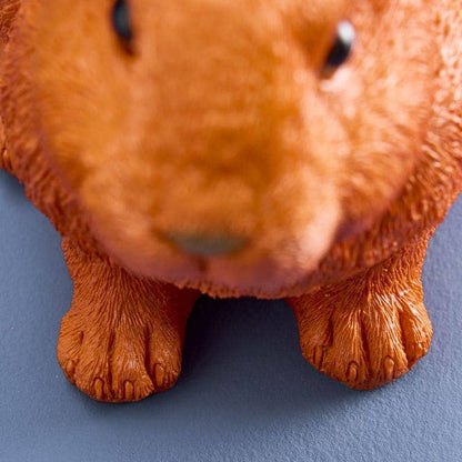 Lapin économe, résine polyuréthane orange, 21 x 11 x 16 cm