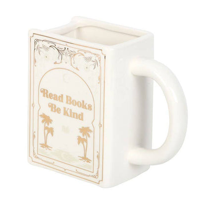 Read books, be kind. White book-shaped mug