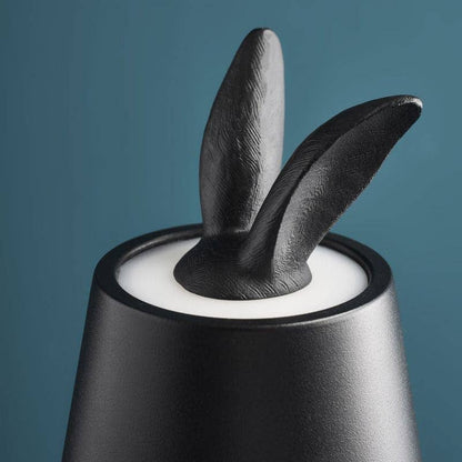 Lámpara de mesa LED con forma de conejo escondido, color negro