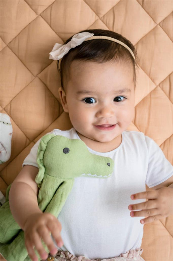 Peluche coccodrillo con supporto per la dentizione