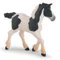 Black and white cob foal figurine