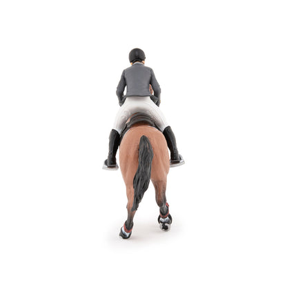 Show jumping horse and rider figurine