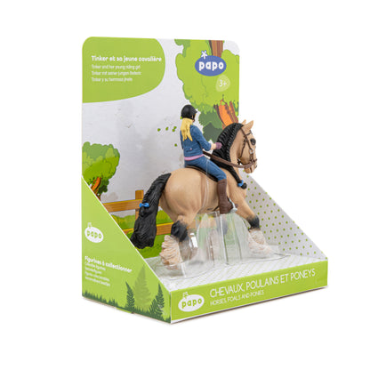 Tinker figurine and her young rider