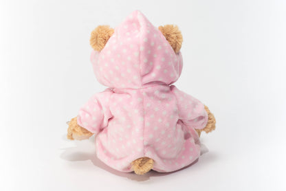 Osito de peluche en pijama rosa