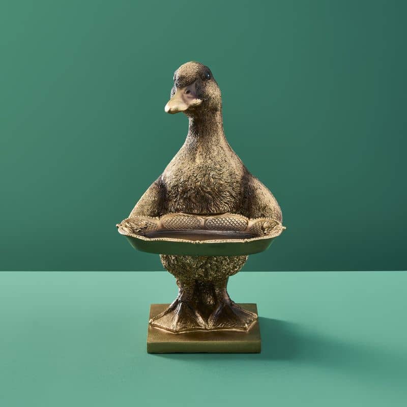 Tarjetero de resina con forma de pato dorado