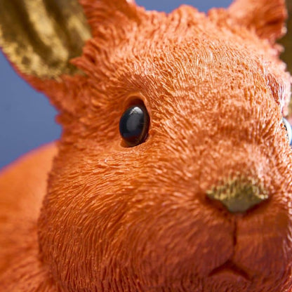 Lapin économe, résine polyuréthane orange, 21 x 11 x 16 cm