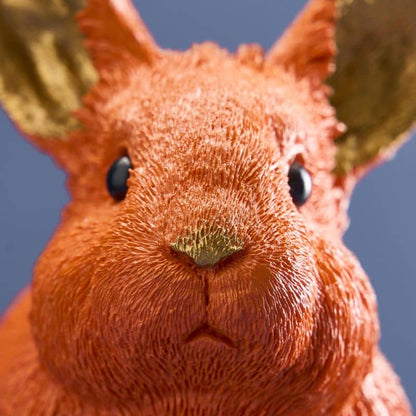 Lapin économe, résine polyuréthane orange, 21 x 11 x 16 cm
