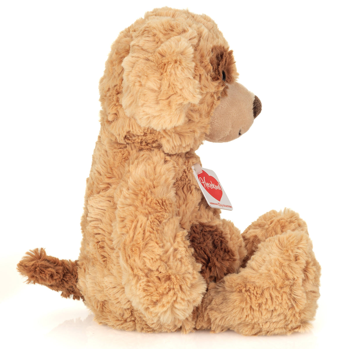Peluche a forma di cane maculato