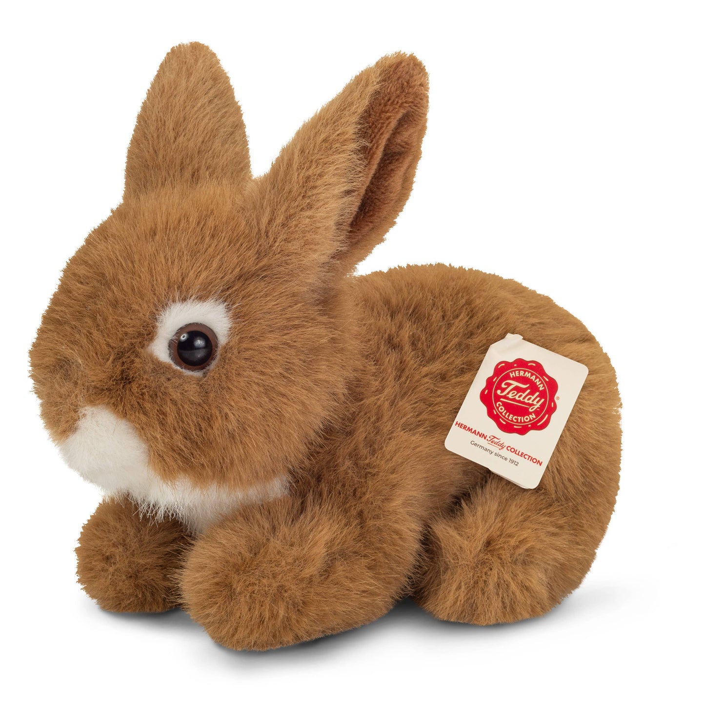 lebre castanha de peluche sentada