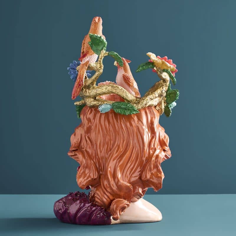 Vase with a woman's head by M. Parrots