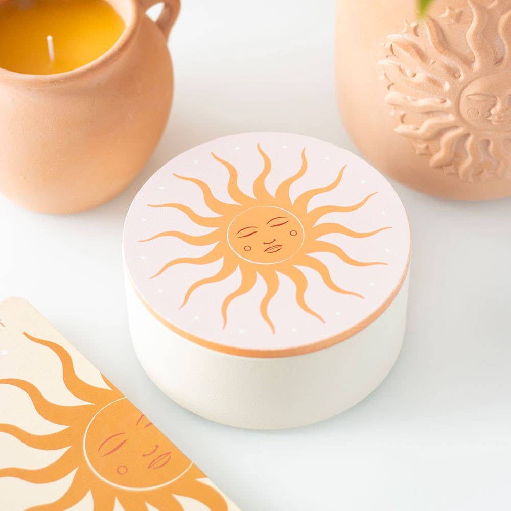 Jewelry storage box with sun motif