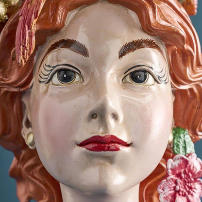 Vase with a woman's head by M. Parrots