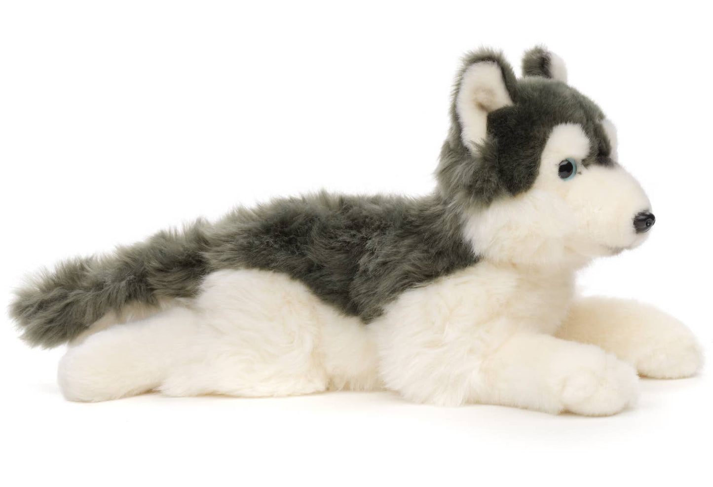 Peluche de husky gris, acostado