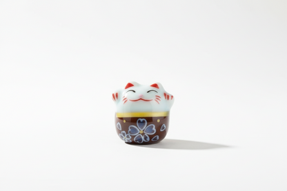 White and plum brown lucky cat pearl