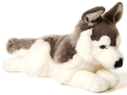 Peluche de husky gris acostado