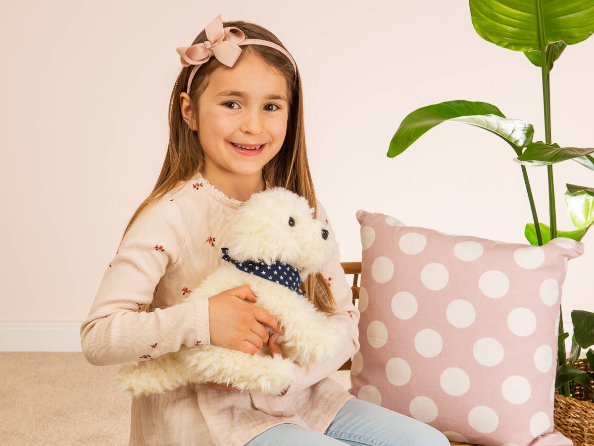 Peluche de labradoodle sentado