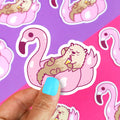 Zwembadfeeststicker: Otter op een flamingo-zwemband