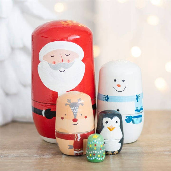 Juego de muñecas rusas navideñas