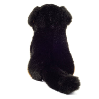 Peluche de perro de montaña bernés sentado