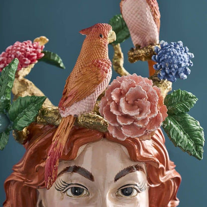 Vase with a woman's head by M. Parrots