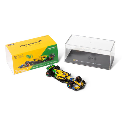 1:43 F1 MCLAREN MCL38 2024 AVEC CASQUE LIVRÉE PIASTRI SENNA