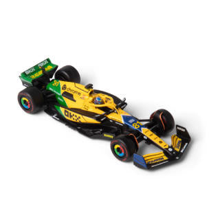 1:43 F1 MCLAREN MCL38 2024 AVEC CASQUE LIVRÉE PIASTRI SENNA