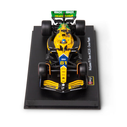 1:43 F1 MCLAREN MCL38 2024 AVEC CASQUE LIVRÉE PIASTRI SENNA
