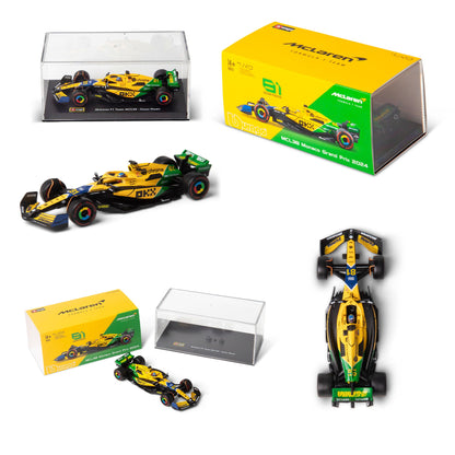 1:43 F1 MCLAREN MCL38 2024 AVEC CASQUE LIVRÉE PIASTRI SENNA