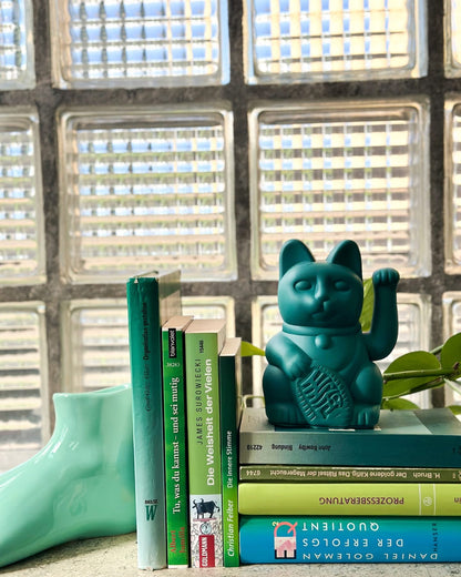 Gato verde afortunado