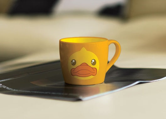 Taza de pato amarillo